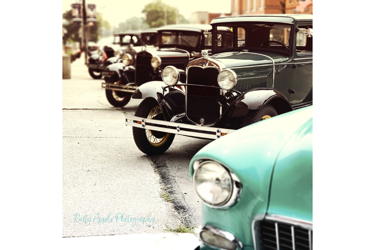 Downtown New London lined up with vintage cars